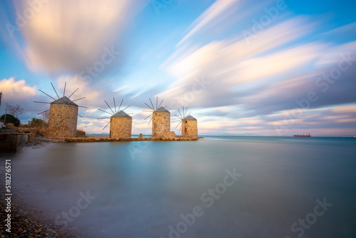 Chios island wind mills on sunset photo