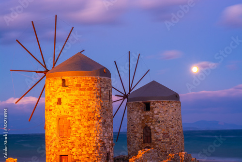 Chios island wind mills on sunset