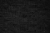 Black Hemp rope texture background. Haircloth wale black dark cloth rustic sackcloth canvas fabric texture.
