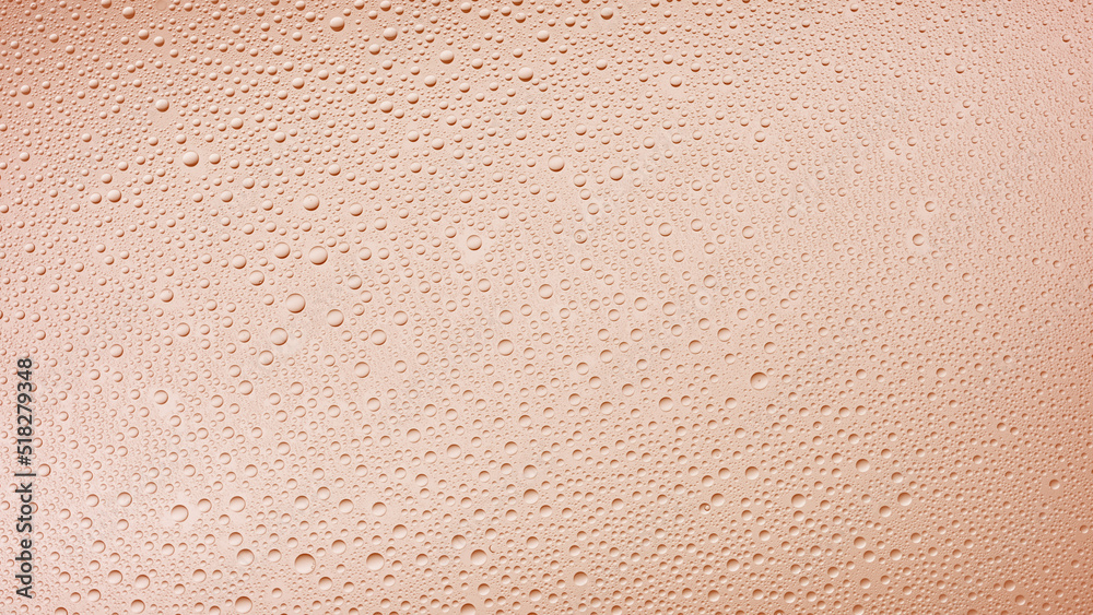 Fototapeta premium Medium size water drops on the wet glass surface on beige background | Background for skin care moisturizing products