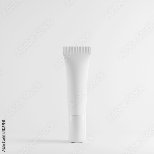 Plastic white cream tube mock up presentation on minimal light background.