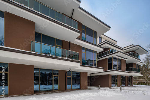 Modern exterior of new luxury residential building at winter. © Aleks Kend