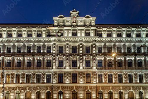 Night cityscape of Riga. Modern illuminated residential building.