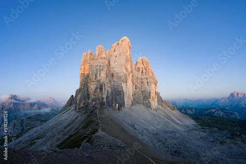 Stunning view of the Three Peaks of Lavaredo   Tre cime di Lavaredo  during a beautiful sunrise. The Three Peaks of Lavaredo are the undisputed symbol of the Dolomites  Italy.