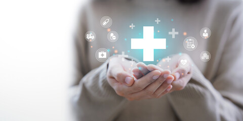 Woman hand holding plus icon for the healthcare medical icon. Health insurance health concept. access to welfare health and copy space,