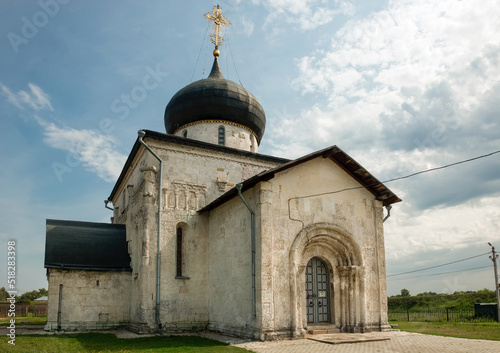 St. George's Cathedral and white stone carvings on the walls. Yuryevsky Kremlin (Archangel-Mikhailovsky Yuryevsky monastery). Yuryev-Polsky town, Vladimir region, Russia photo