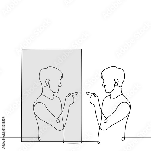 man points his finger at his reflection in the mirror - one line drawing vector. concept self-confidence; self-accusation; self-flagellation