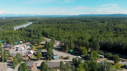 4K Drone Video of Talkeetna, AK Village along the Susitna River with Mt. Denali in distance on Sunny Summer Day photo