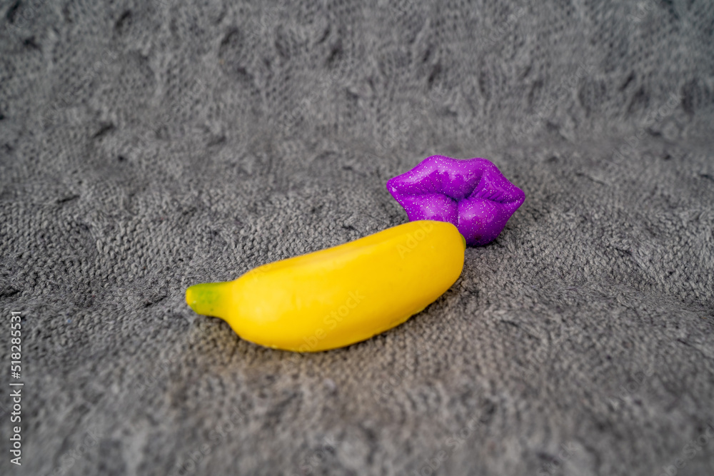 sexy bright lips kissing banana, concept of oral sex, erotica Stock