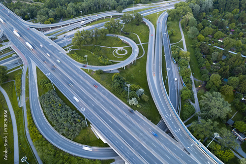 Wallpaper Mural Busy intersection multilane road suronded by nature in the city of Warsaw. Rush hour. Torontodigital.ca