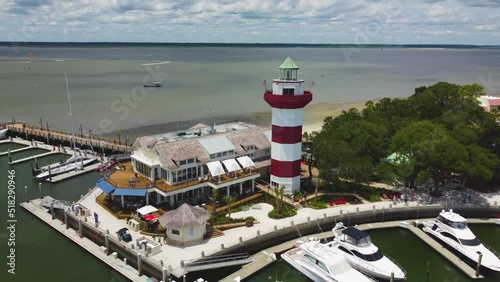 A wide orbiting shot of the lighthouse at Harbor Town on Hilton Head Island, SC photo