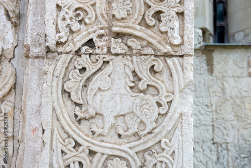 White stone carving on the walls of St. George's Cathedral. Yuryevsky Kremlin (Archangel-Mikhailovsky Yuryevsky monastery). Yuryev-Polsky town, Vladimir region, Russia