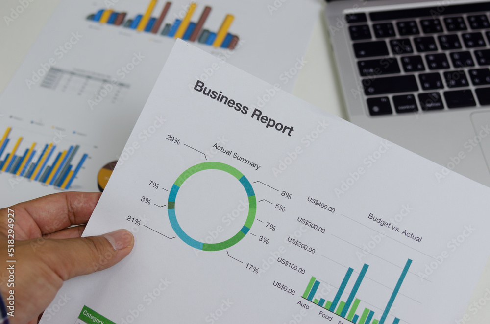 Business document chart report financial and graph statistic analysis management information and research investment plan sale on desk at office. Business document chart report financial and graph statistic analysis management information and research investment plan sale on desk at office.