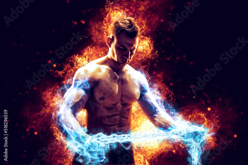 Muscular man with naked torso holding electric energy chain. Isolated on dark background with fire