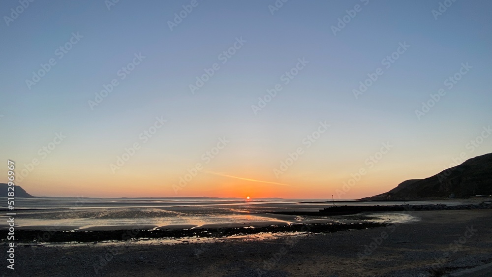 sunset over the sea sunset over the sea