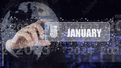 January 5th. Day 5 of month, Calendar date. Hand hold virtual screen card with calendar date. Winter month, day of the year concept.