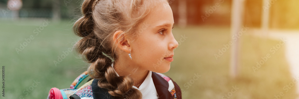 back to school. face portrait little happy kid pupil schoolgirl eight year old in fashion uniform with backpack and hairstyle braid ready going second grade first day primary school. banner. flare back to school. face portrait little happy kid pupil schoolgirl eight year old in fashion uniform with backpack and hairstyle braid ready going second grade first day primary school. banner. flare