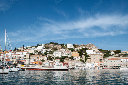Port of small Mediterranean island town view in clear sunny summer day
