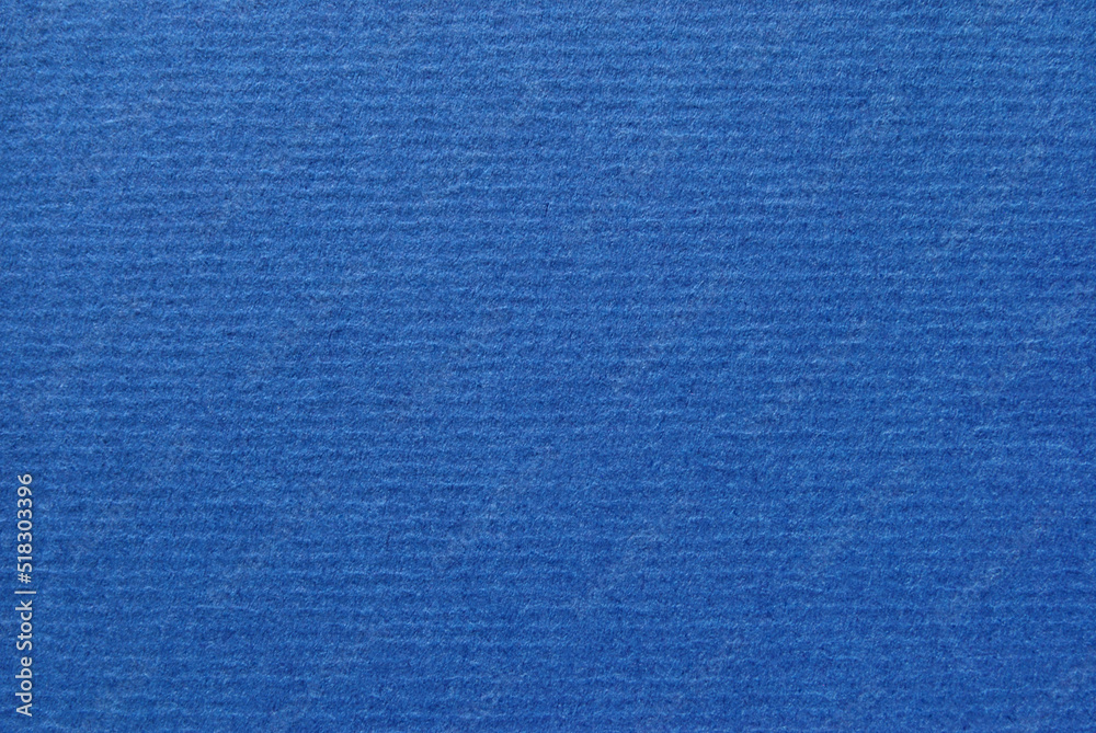 Stockfoto med beskrivningen Blue bolor corrugated craft paper