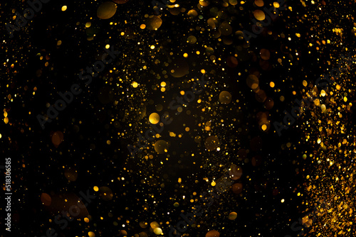 Gold glitter lights bokeh festive overlay abstract background photo