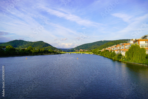 View of the Neckar and Heidelberg from the Wehrsteg Wieblingen. Weir on the Neckar. Pedestrian and bike path.
 photo