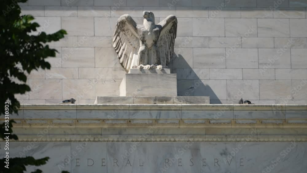 Closeup of the top of the federal reserve government Eccles building in Washington, DC where inflation financial policy is made.
