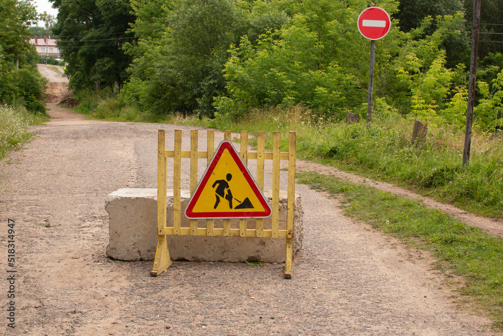 Road Works Sign For Construction Works In City Street Road Under road-works-sign-for-construction-works-in-city-street-road-under
