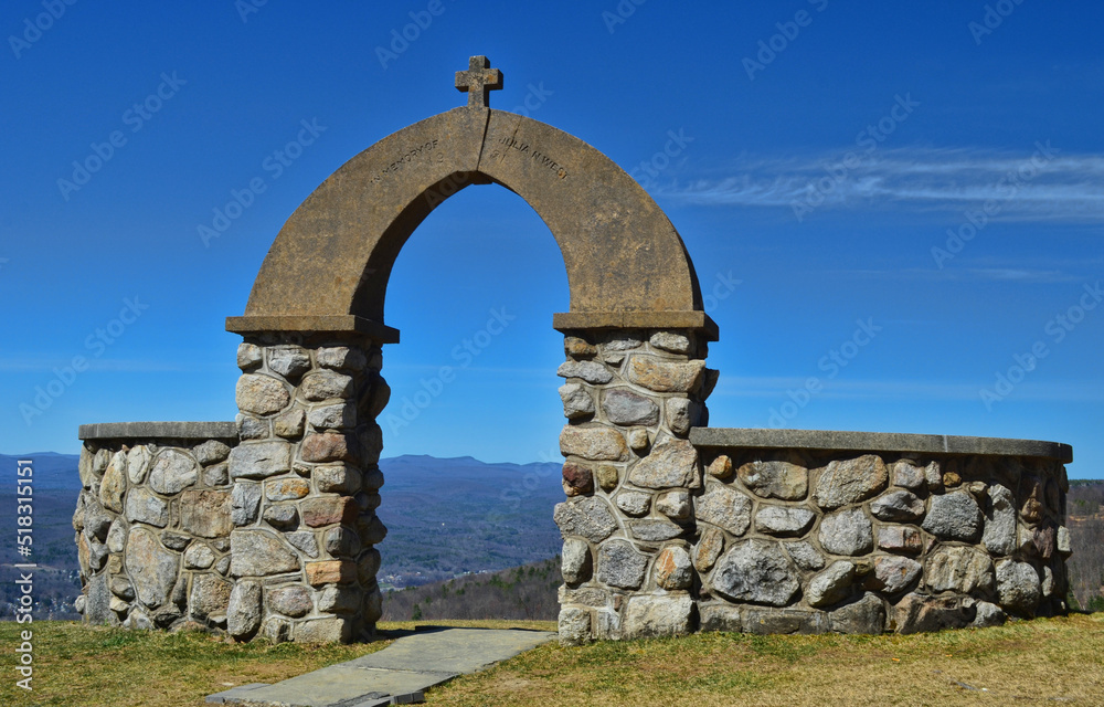 Stone arch atop a mountain