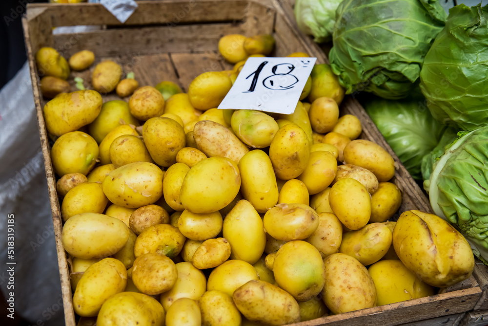 Seasonal vegetables at the agricultural market, potatoes