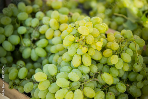 Seasonal fruits at the agricultural market, white grape