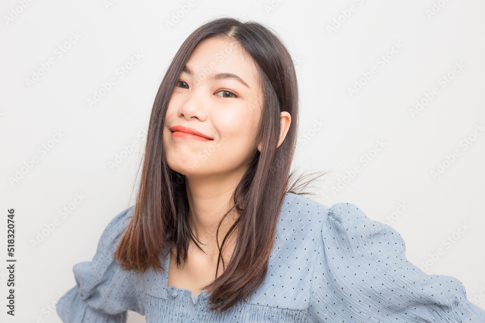 Smiling young asian beautiful women posting on white background