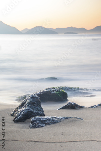 long exposure details of the red beach of Urca in Rio de Janeiro, Brazil photo