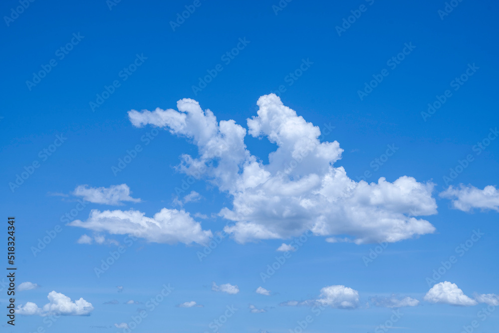 Blue sky with white clouds.