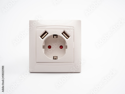 Universal European standard socket with two usb connectors on a white background.