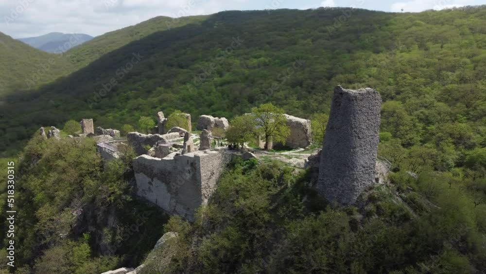 An abandoned castle in the mountains. Georgia. Drone video An abandoned castle in the mountains. Georgia. Drone video