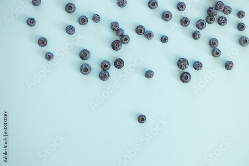 Blueberry isolated on blue background.