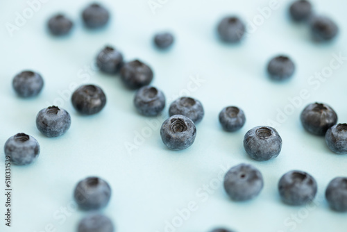 Blueberry isolated on blue background.