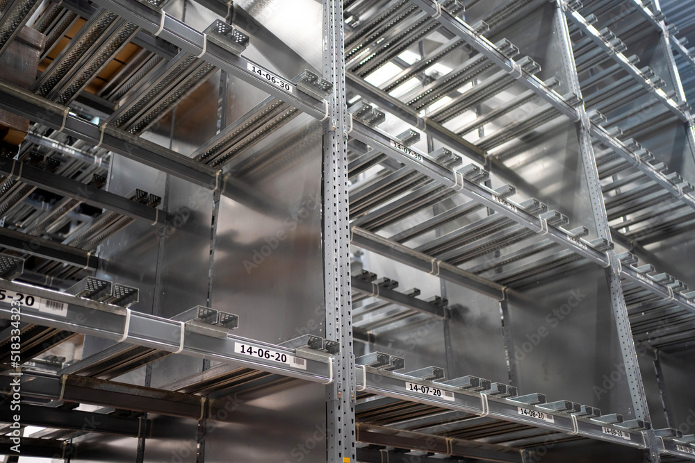 Empty warehouse ineterior with industrial racks pallets shelves. Warehouse background