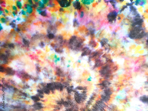 Colorful Color Spiral Tie Dye. Modern Bright Tie Dye Cloth Texture. Spiral Tie Dye Effect Background. Graphic Colorful Spiral Tie Dye Dye Shirt.