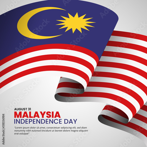Hari Merdeka Malaysia or Malaysia independence day background with a big waving flag photo