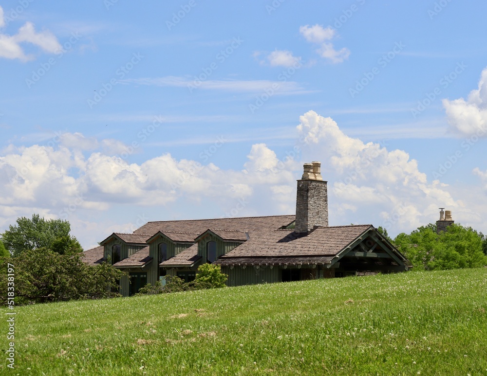 The white clouds over the building in the countryside. The white clouds over the building in the countryside.