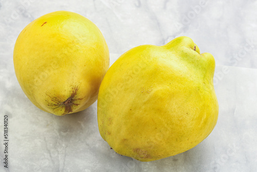 Fresh ripe yellow quince fruit