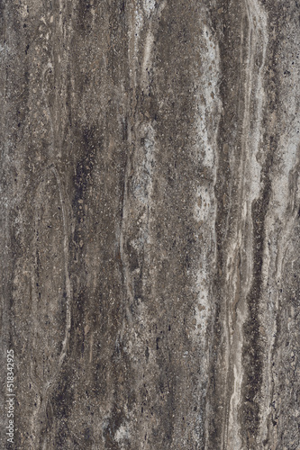 Natural stone texture top view. Brown marble, matt surface, Italian slab, granite, ivory texture, ceramic wall floor tiles. Rustic Natural porcelain stoneware vertical background. Limestone pattern. © Maksim