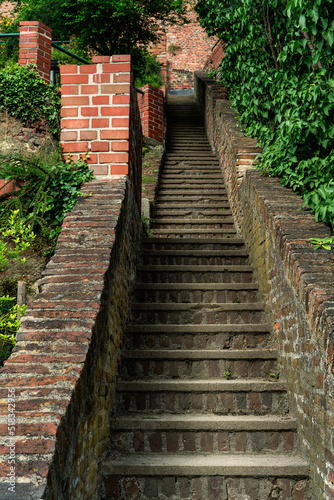 Staircase with brick walls in a park.