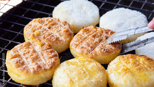 Khao jee: a street style Thai style grill sticky rice, with egg paste.