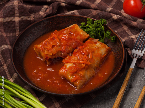 stuffed cabbage rolls with meat in tomato sauce photo