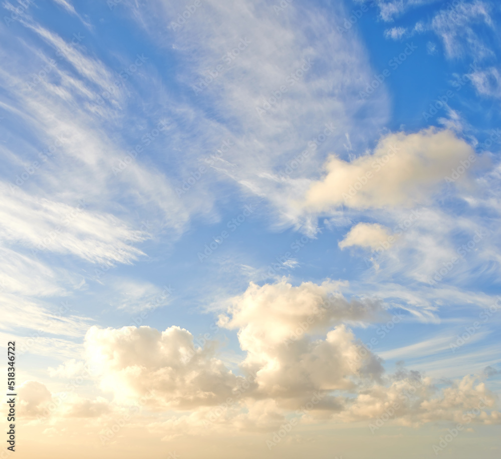 Cumulus cloud with sun shining on it. Beautiful scenery of the heavens and atmosphere with fluffy clouds, sunlight and flare. Cloudscape copy space of a bright sky on a sunny summer day from below Cumulus cloud with sun shining on it. Beautiful scenery of the heavens and atmosphere with fluffy clouds, sunlight and flare. Cloudscape copy space of a bright sky on a sunny summer day from below