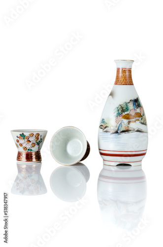 Set Ceramic bottles and cup Japanese style sake oriental drink, front view, and reflection isolated on a white background are Suitable for creative graphic design, and clipping path.