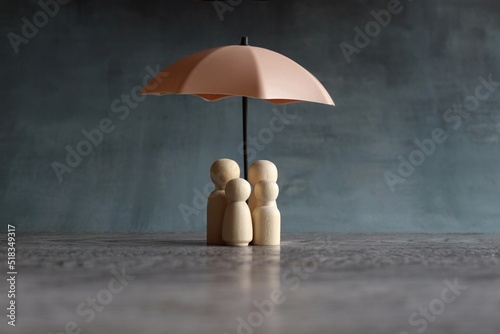 Fotobehang Umbrella and wooden dolls with copy space