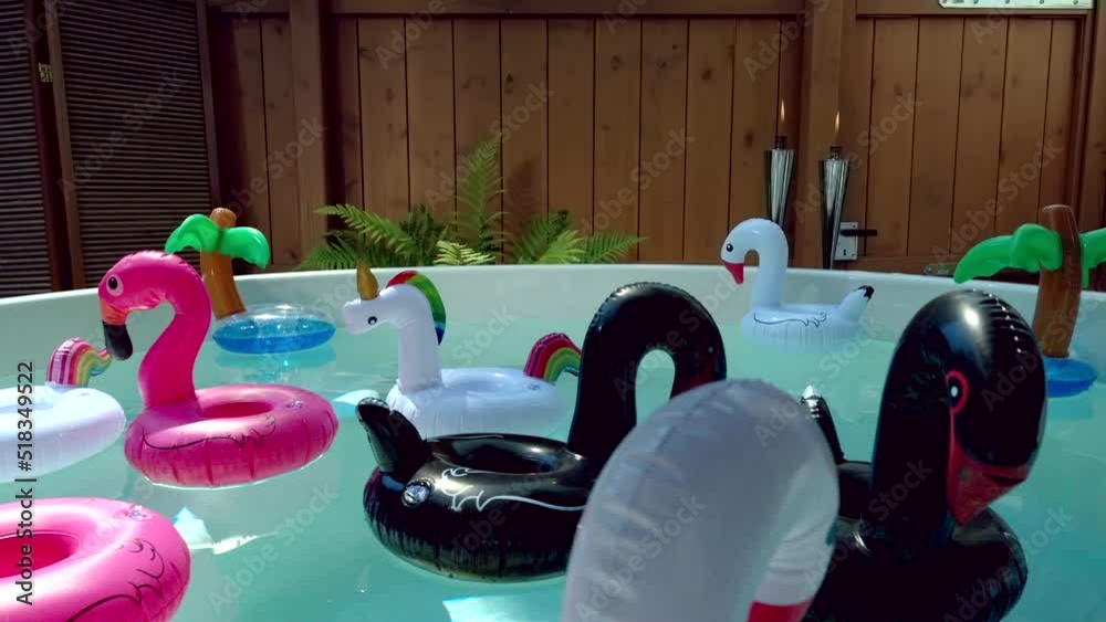 Floating inflatable drink holder swans, unicorns, palm trees and flamingos